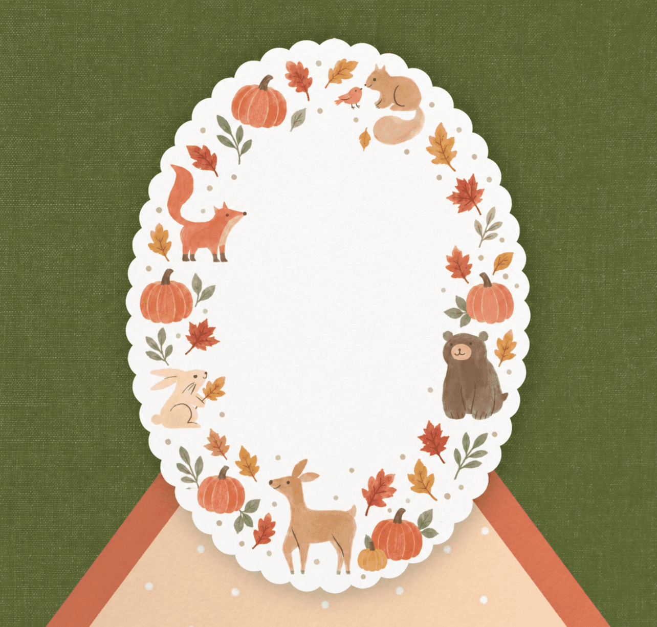 Watercolor woodland animals, pumpkins, and autumn leaves around a scalloped invitation